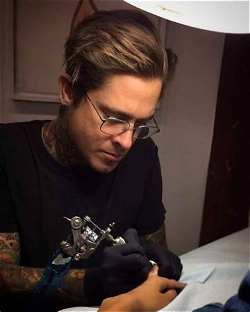 Discover Nathan Kostechko's Tattoo Masterpieces