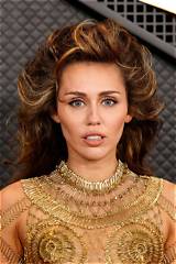 See the Latest Pics of Miley Cyrus' Growing Baby Bump