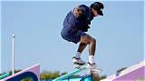 Unveil the Hidden Meanings Behind Nyjah Huston's Tattoos